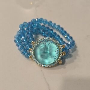 Blue Beaded Bracelet with Moon Face Charm
